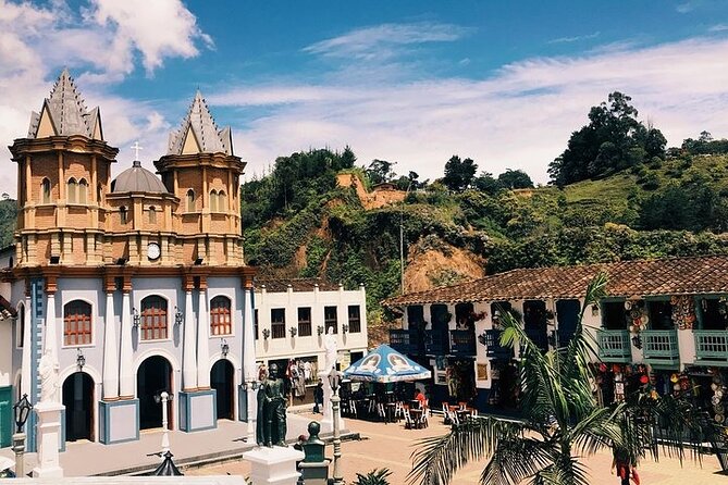 Amazing Private Guatape Tour + Boat Ride + Helicopter & Rock - The Malecon de Guatapé and time at a colorful plaza