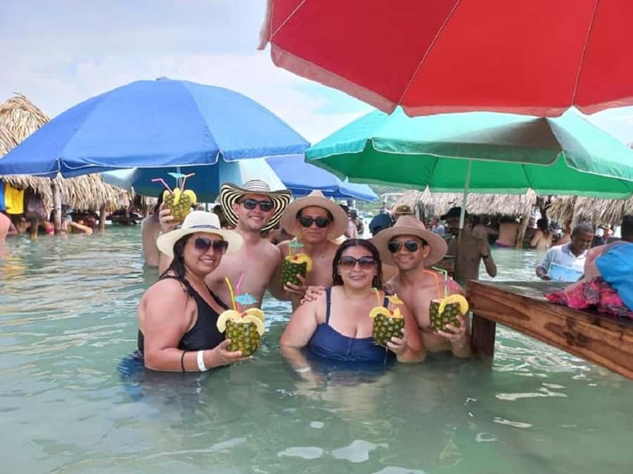 Cartagena: CHOLON & BARU with lunch - Entering Cholón: palm trees, dry cabins, and the party-meet-people vibe