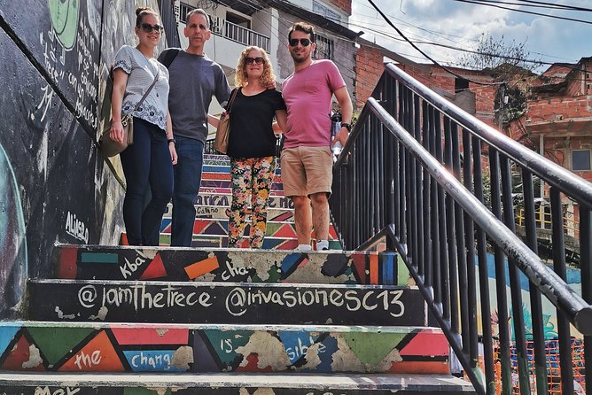 Comuna 13 & Coffee Farm Private Tour in Medellin | The Best Combo - Comuna 13 electric escalators and graffiti with meaning