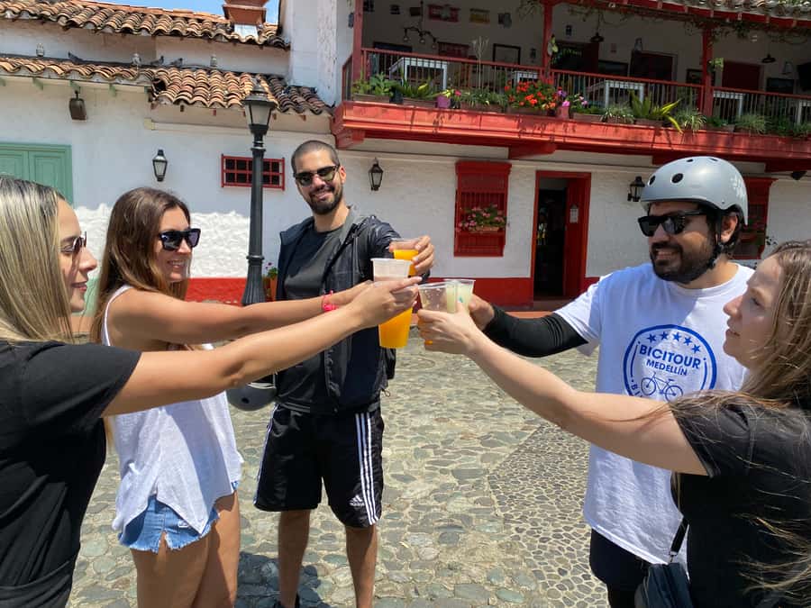 E-Bike City Tour Medellin with Local beer and Snacks - Food and Drink Break: Local Snack, Then Beer or Juice