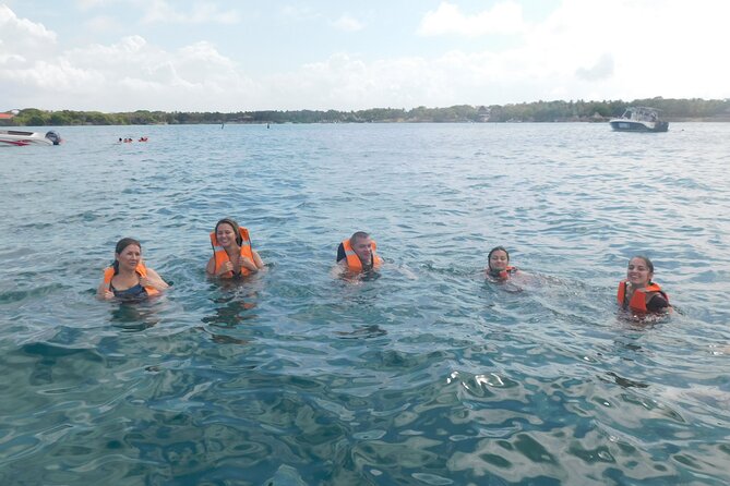 Family Day Trip - Private Boat Charter To The Rosario Islands - Islas de Rosario: beach club time and easy water fun