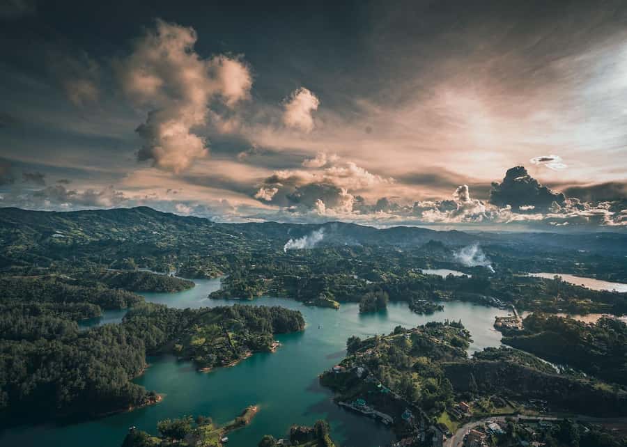 From Medellín: Guatape Private Tour, El Peñol, Boat Ride - Pan de bono, coffee, and the animal farm stop that makes it feel local