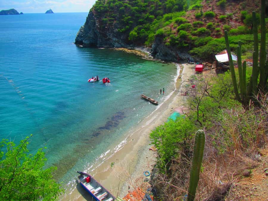 From Santa Marta: Sisiguaca Beach Hike with Snorkeling - Parque de los Novios, Santander Statue, and the Calm Start