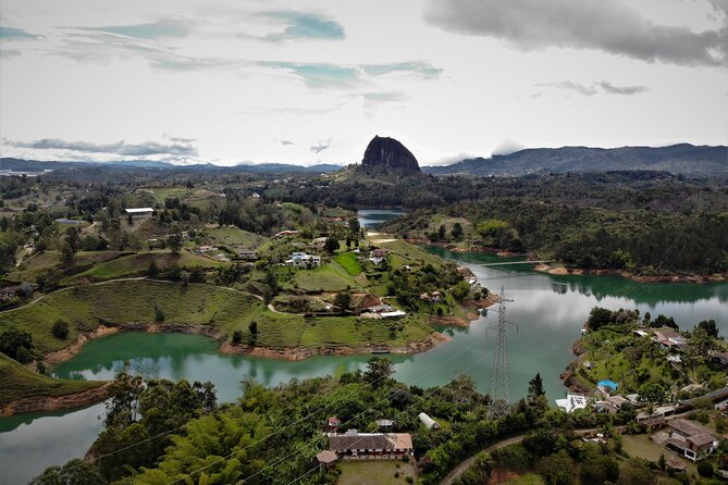 Full Day Private Tour to Guatapé and El Peñol - Stop 2: Piedra del Peñol, 700 steps and a payoff that feels real