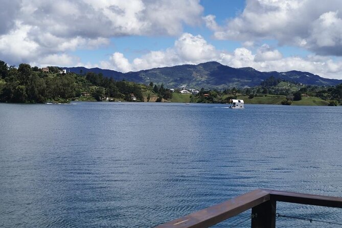 Guatape and El Peñol town and dam tour from Medellin - Private boat on the Guatapé dam: seeing the rock from water level