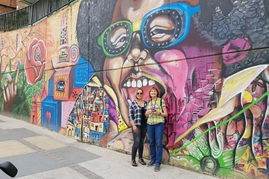 Medellín: 5.5-Hour Guided Private City Tour - Comuna 13: street art, local shops, and a neighborhood feel