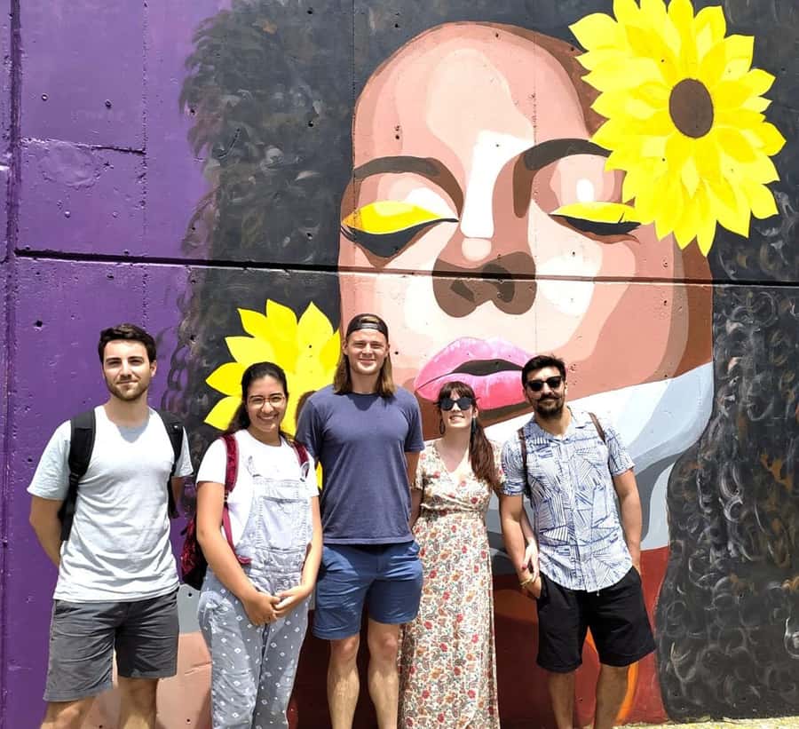 Medellín: Comuna 13 District Tour with Cable Car Ride - Outdoor escalators, the top deck, and the moment the neighborhood opens up