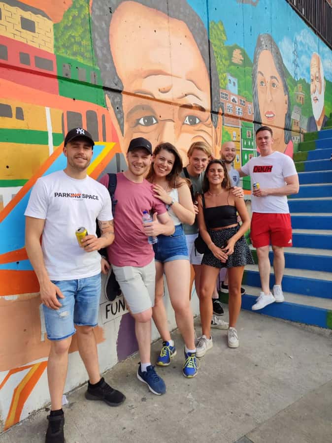 Medellín: Comuna 13 District Tour with Cable Car Ride - Meeting locals and the community library stop