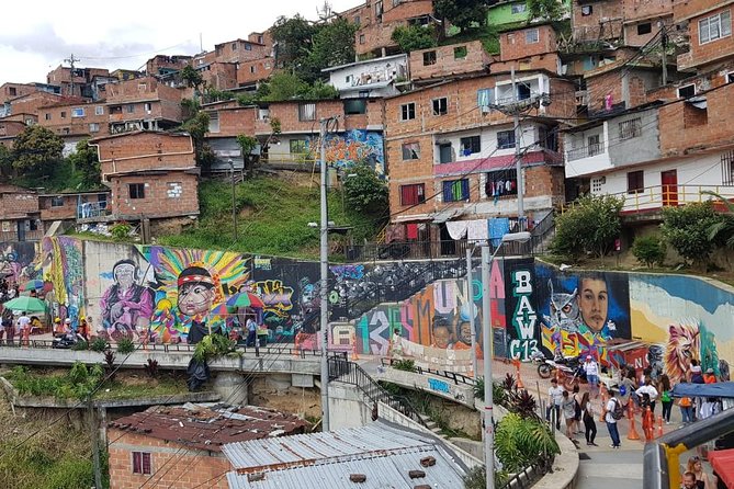 Medellín & Comuna 13 Private Tour - Stop 2: Electric escalators, street art time, and local snacks