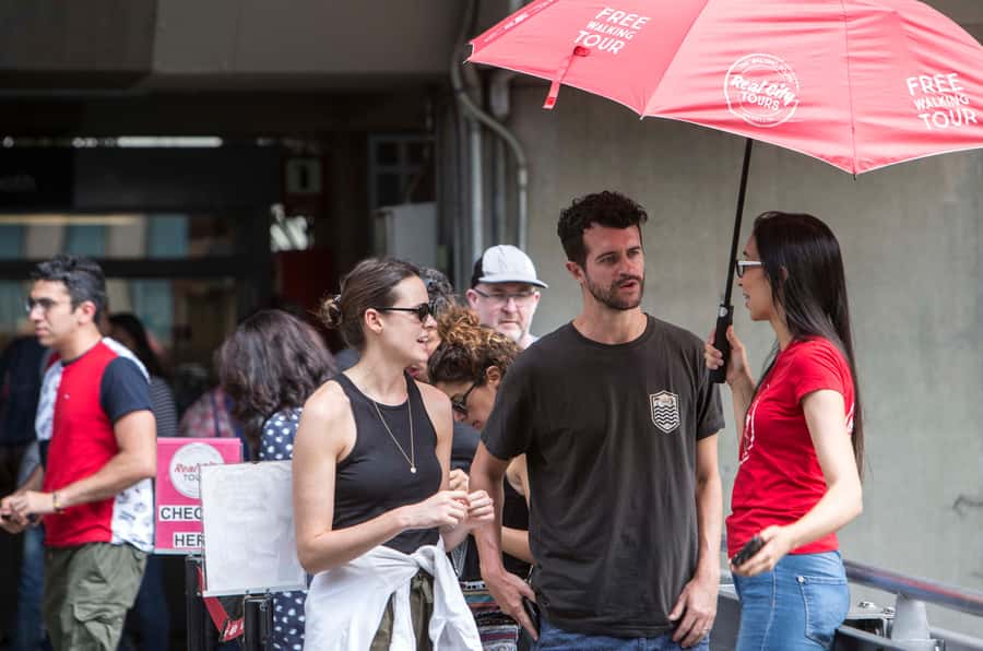 Medellin Historic Walking Tour - National Palace Mall break time, photos, and a downtown pause
