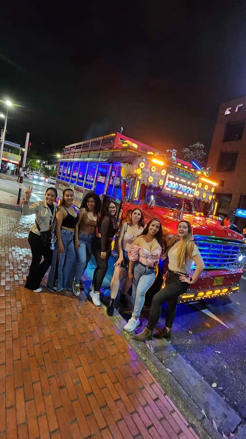 Medellin: Party Bus with DJ & Street Food Tastings - A 4-hour party bus that keeps the food and music moving