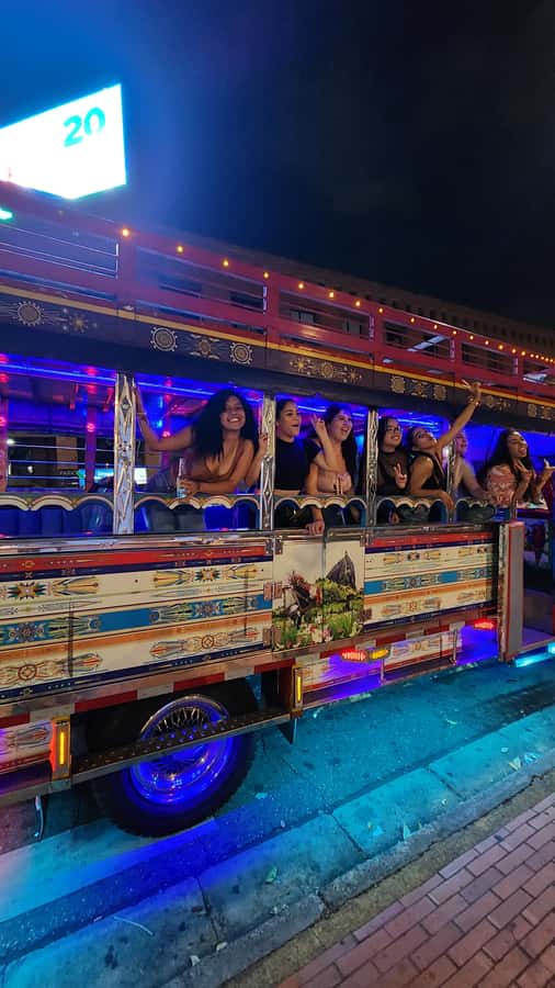 Medellin: Party Bus with DJ & Street Food Tastings - Golden Mile (Milla de Oro): views and the polished side of the city