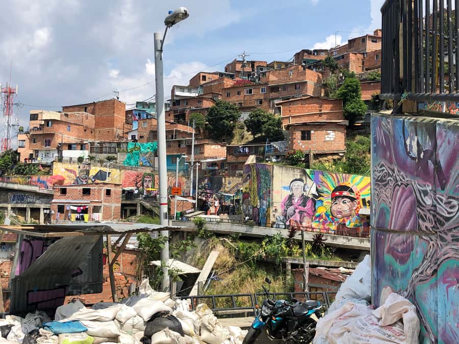 Medellín: Private Comuna 13 Street Art Tour - Exploring Comuna 13 on foot: murals, escalators, and an observation deck