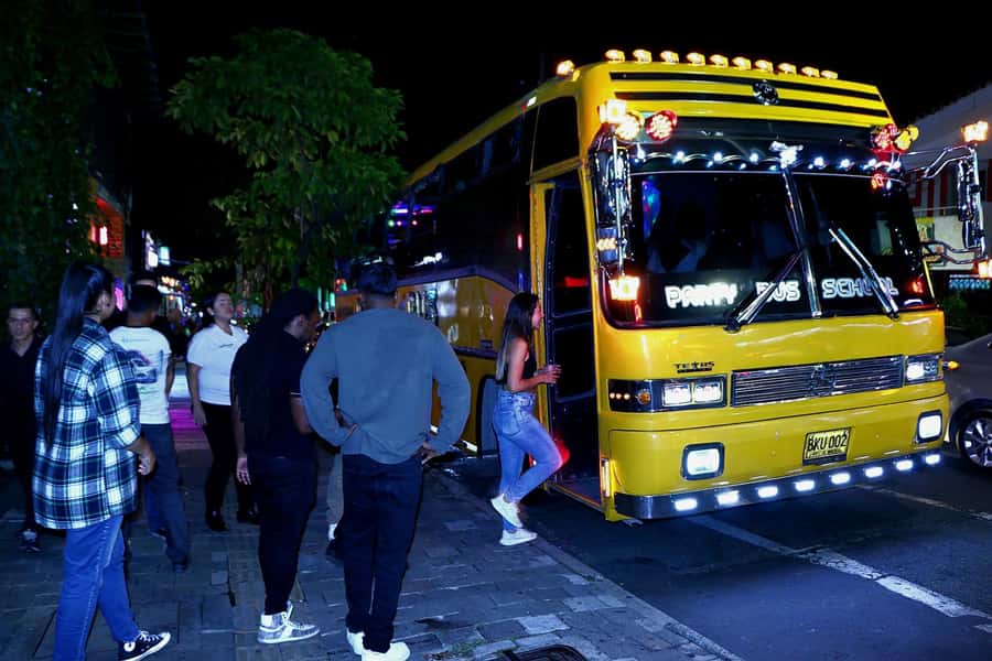 Medellin: Rumbero Party Bus with all the beer you can drink - Where the ride takes you: Puente de la 4 Sur at night