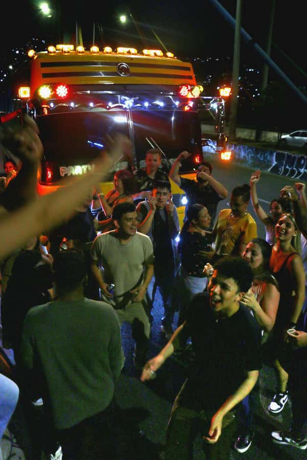 Medellin: Rumbero Party Bus with all the beer you can drink - Calle 70: where the street energy fits the party mood