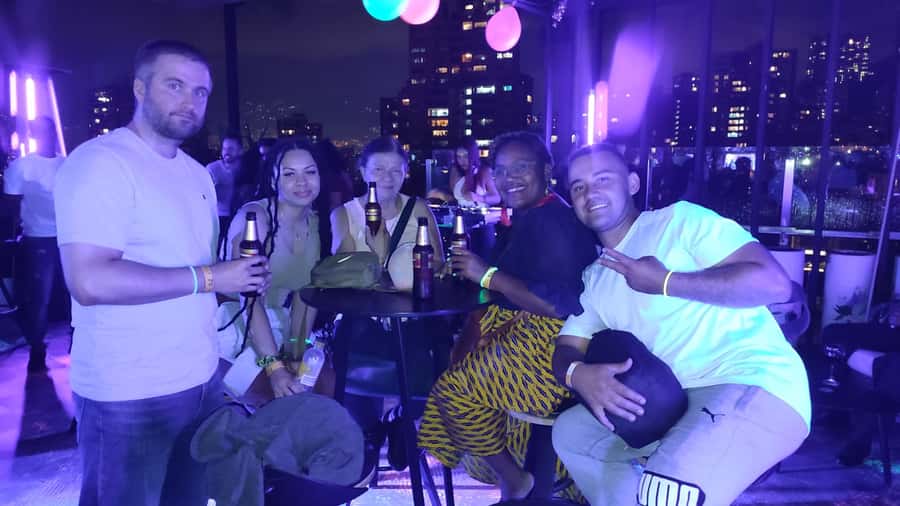 Medellin: Street Food and Poblado Rooftop Tour with a Local - Meeting at San José Church, then warming up in El Poblado