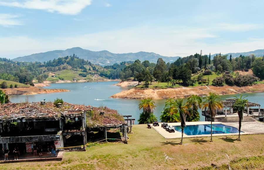 Pablo Escobar Mansion+Paintball+Boat+ATV (Private Guatape) - Finca La Manuela: a walk, a shooting range, and quad biking