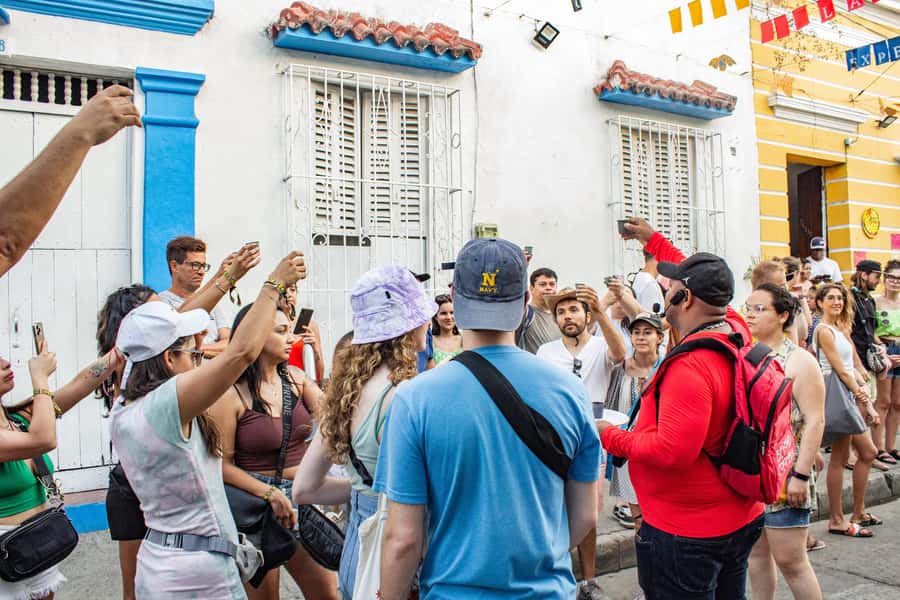 Shared Old Cartagena & Getsemani Tour with Wireless System - Crossing into Getsemaní: Plaza de la Trinidad as the social center