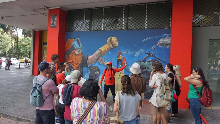 Shared Tour Cali's Salsa, Graffiti & Resistance Experience - Calle del Pecado and river boulevard curve, where nightlife gets explained