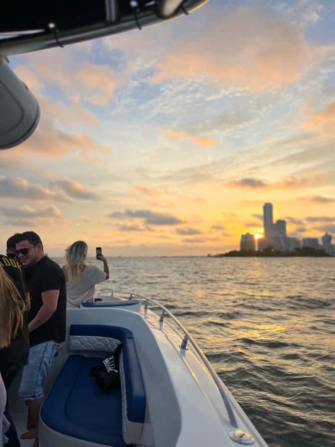 Sunset Party open bar on the bay while sharing with locals - Practical Tips Before You Go