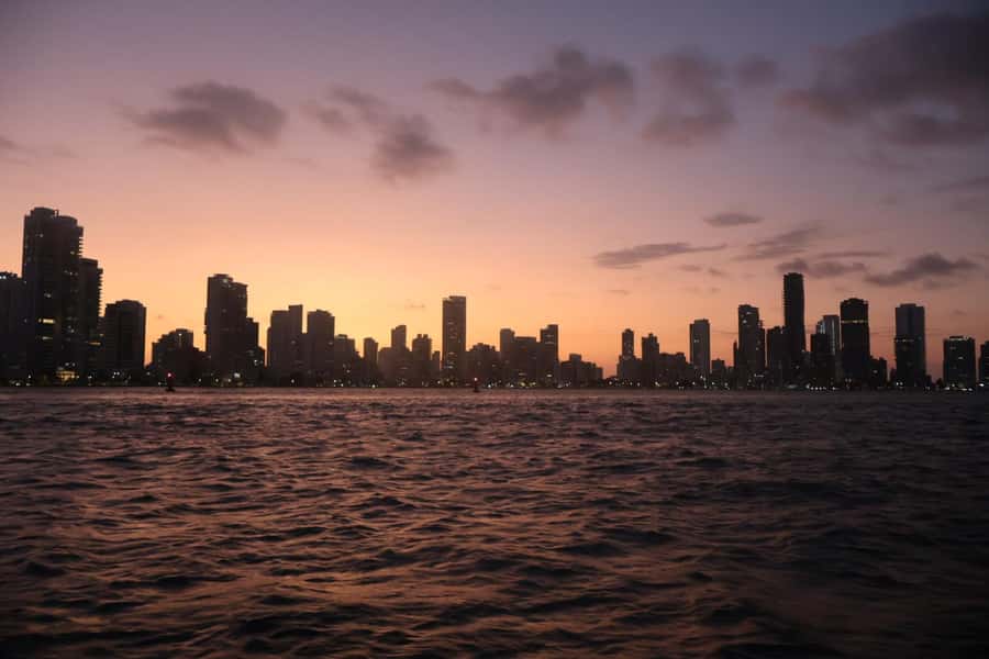 Sunset Party open bar on the bay while sharing with locals - Open Bar Details: Aguardiente, Rum, Juice, and Coke